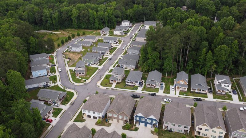 Aerial view of Browns Mill Village, a completed Atlanta Habitat for Humanity neighborhood of single-family homes and townhomes