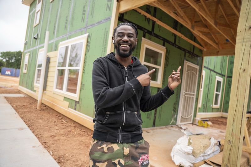 Jabari, a future Langston Park homeowner, smiling